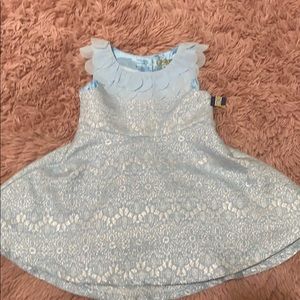 Light blue with silver stitch accents